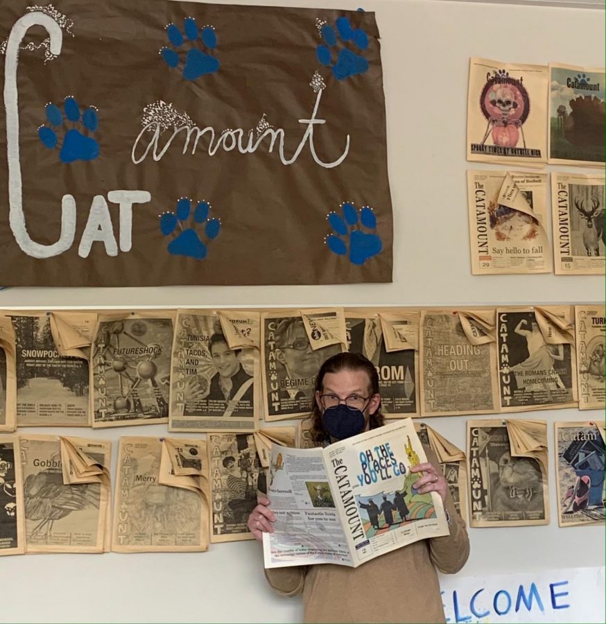 Mr. Crouch in the Catamount newsroom, surrounded by past issues and wonderful memories. Photo by Cyrus Comstock (24)